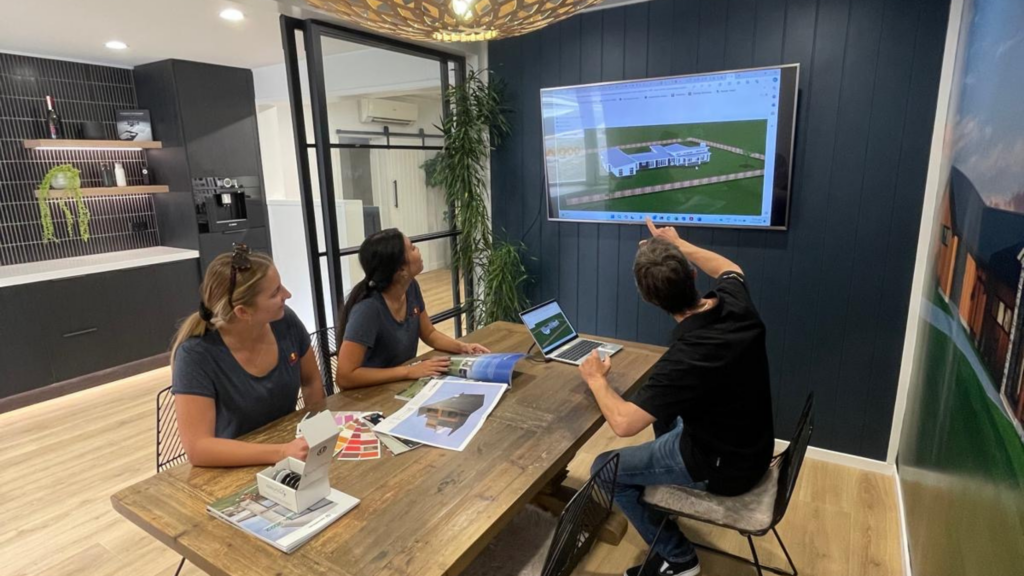 Stonewood Homes Team Discussing 3d Home Plan in Australia